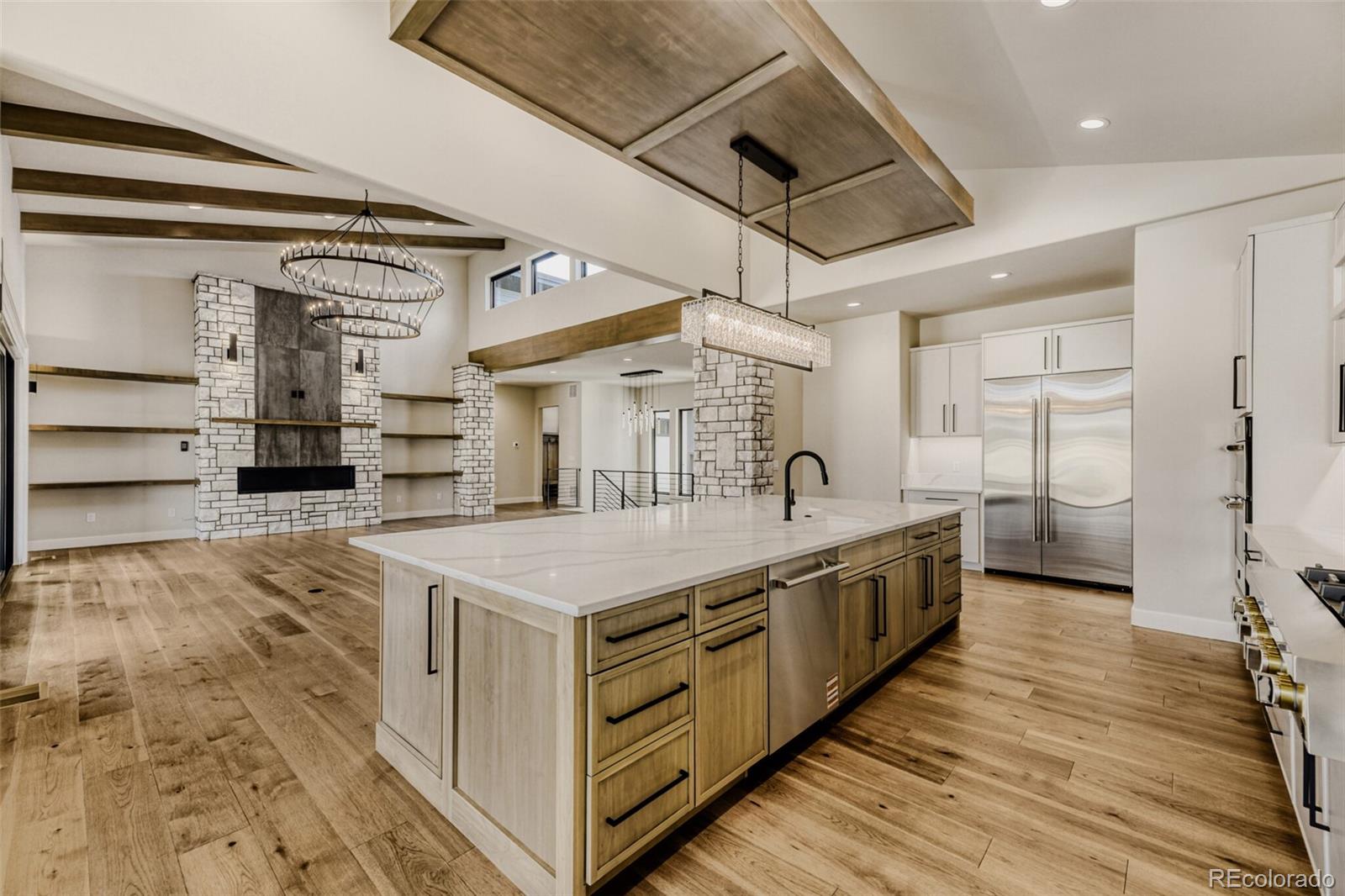 5796 Powell Road Parker, CO 80134 - Photo 13 of 50 a large kitchen with a stove and refrigerator
