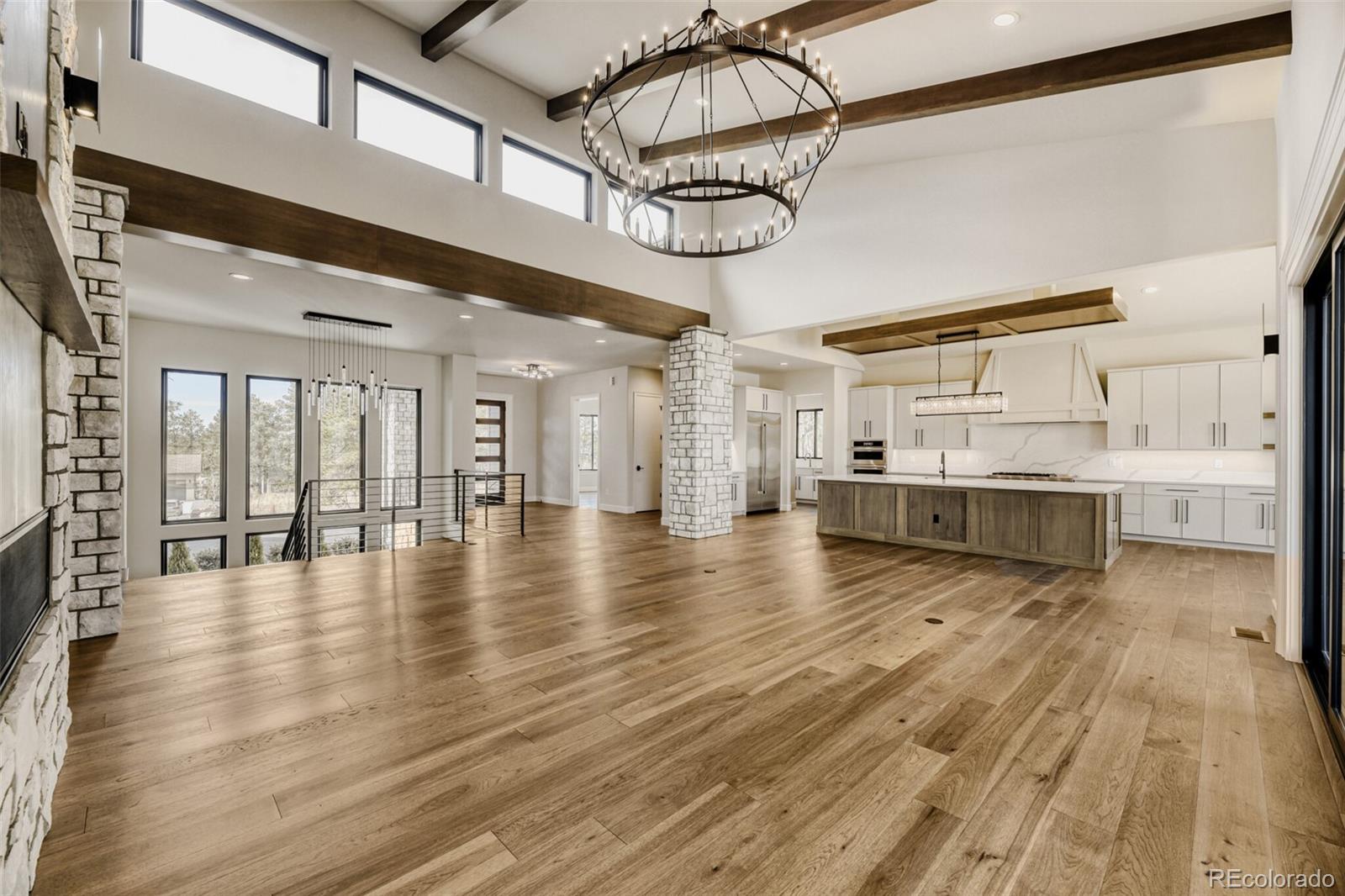 5796 Powell Road Parker, CO 80134 - Photo 16 of 50 a view of a room with wooden floor