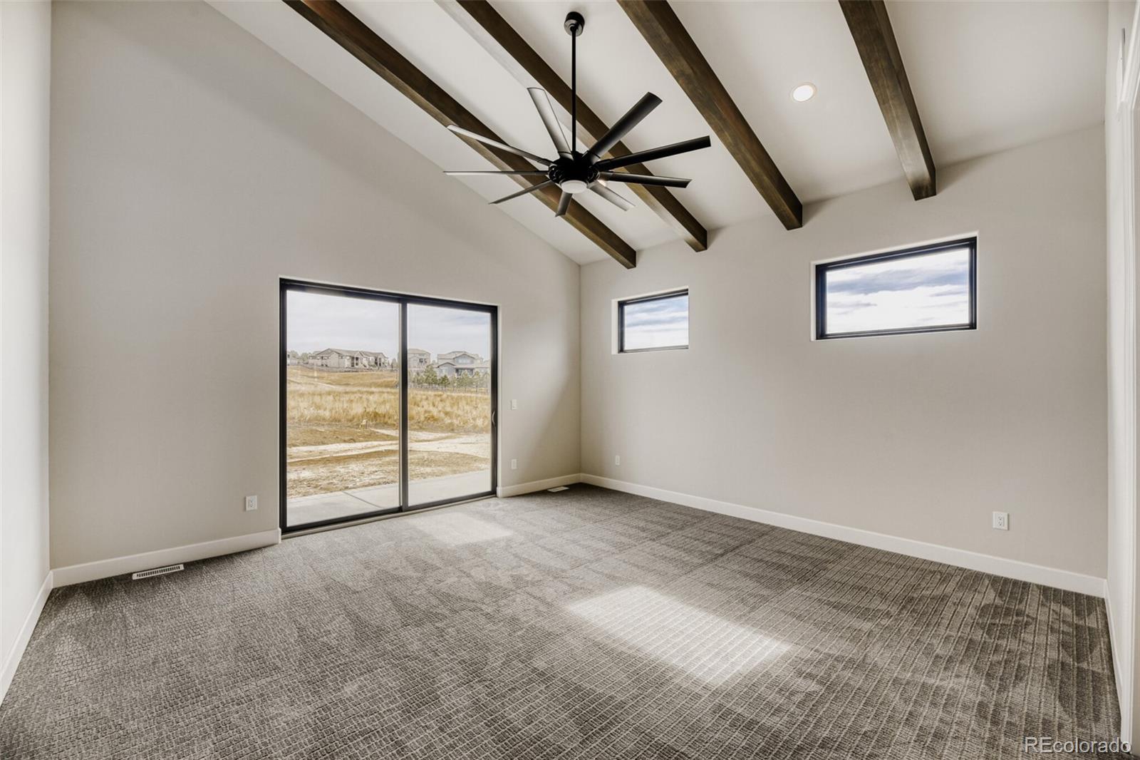 5796 Powell Road Parker, CO 80134 - Photo 22 of 50 an empty room with windows