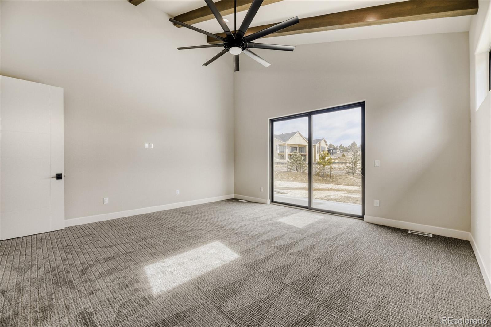 5796 Powell Road Parker, CO 80134 - Photo 24 of 50 a view of an empty room with a window