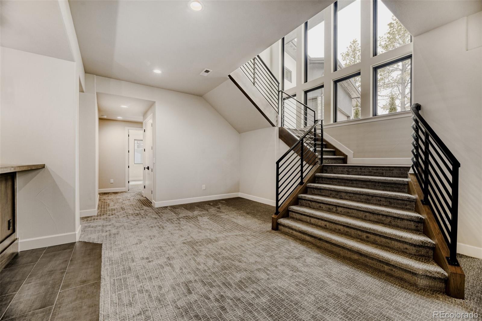 5796 Powell Road Parker, CO 80134 - Photo 30 of 50 a view of entryway with wooden floor