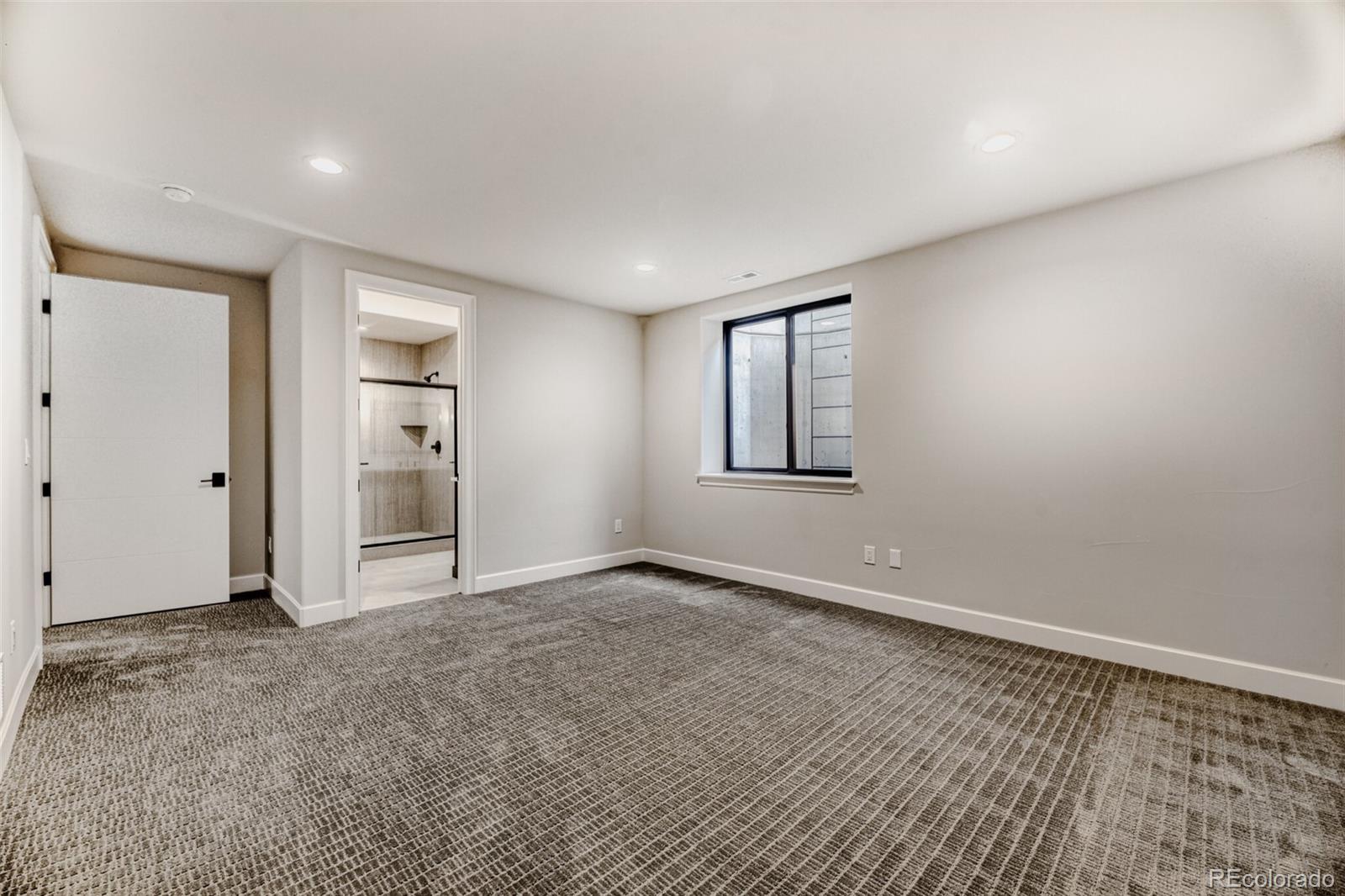 5796 Powell Road Parker, CO 80134 - Photo 39 of 50 an empty room with windows