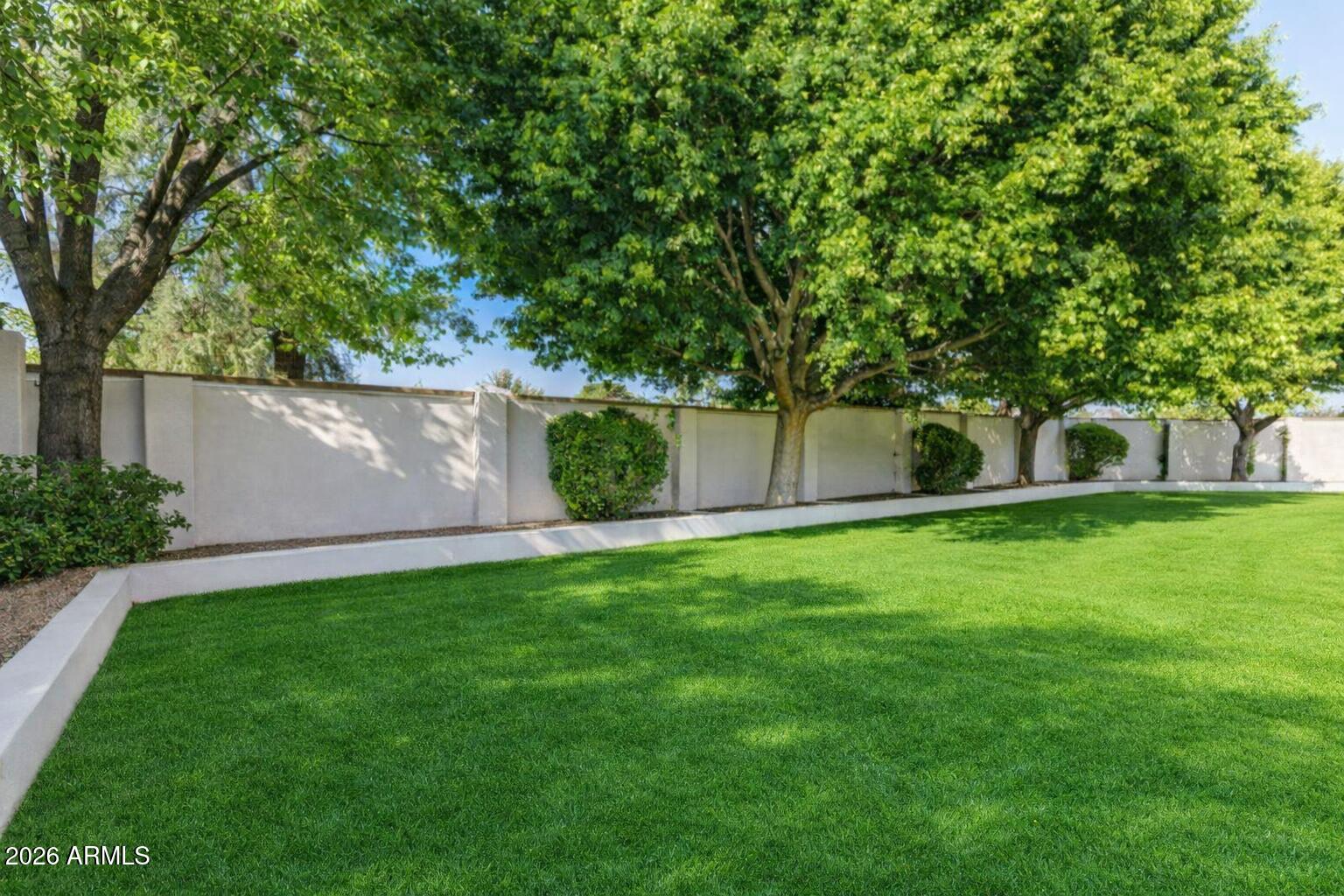 8204 South Homestead Lane Tempe, AZ 85284 - Photo 76 of 84 Serene garden with white pathway (5)