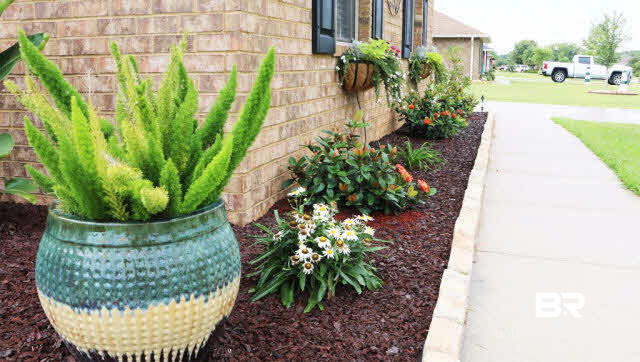 138 Meadow Run Loop West Foley, AL 36535 - Photo 3 of 24 Meticulous front landscaping with sprinkler system
