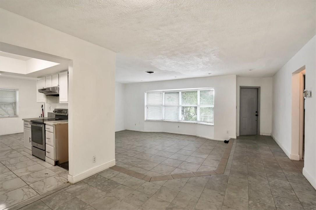 830 Southwest 50th Avenue Margate, FL 33068 - Photo 12 of 30 a view of an empty room with a window