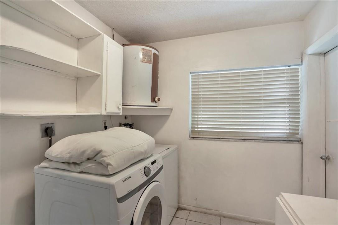 830 Southwest 50th Avenue Margate, FL 33068 - Photo 17 of 30 a utility room with dryer and washer