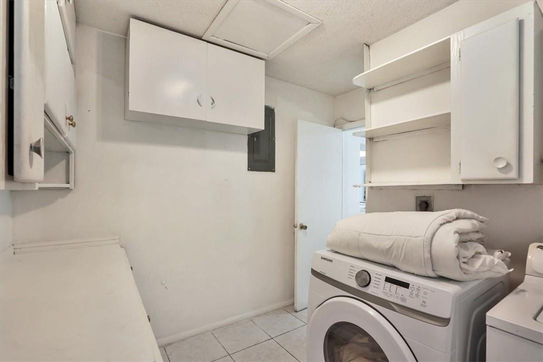 830 Southwest 50th Avenue Margate, FL 33068 - Photo 18 of 30 a utility room with dryer and washer