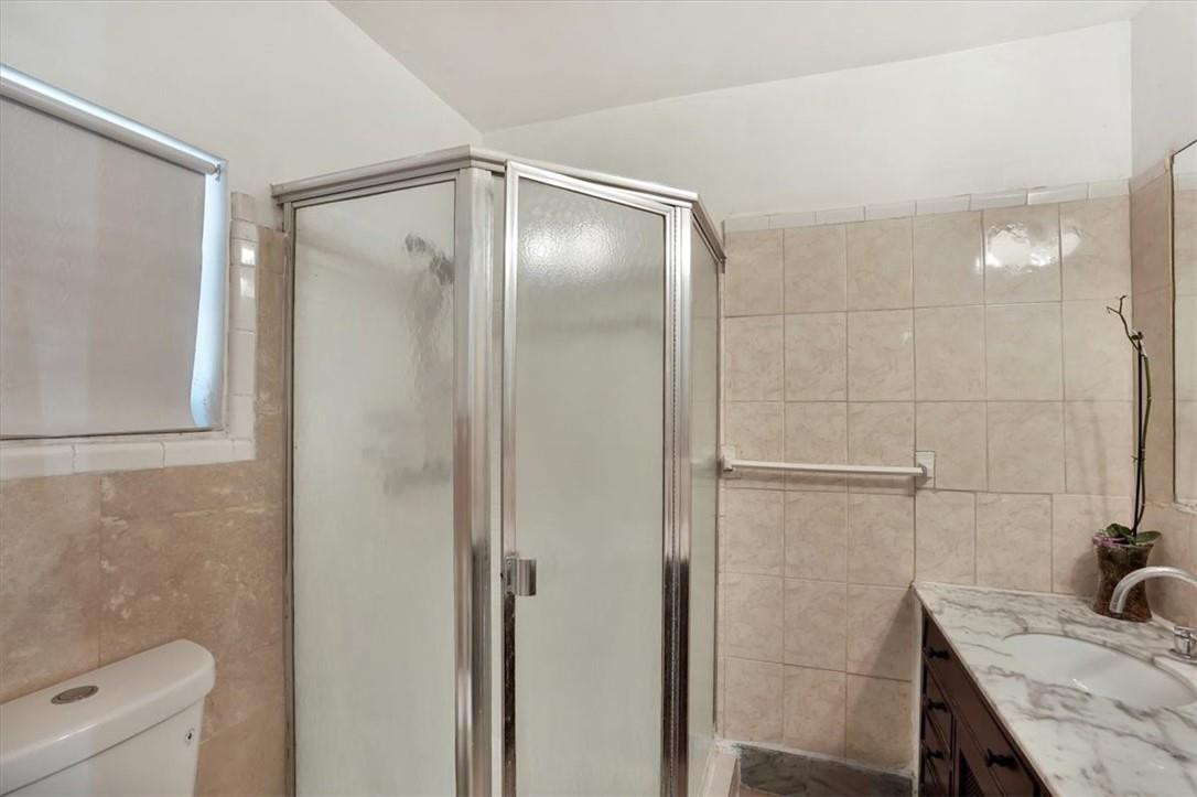 830 Southwest 50th Avenue Margate, FL 33068 - Photo 26 of 30 a bathroom with a shower and a sink