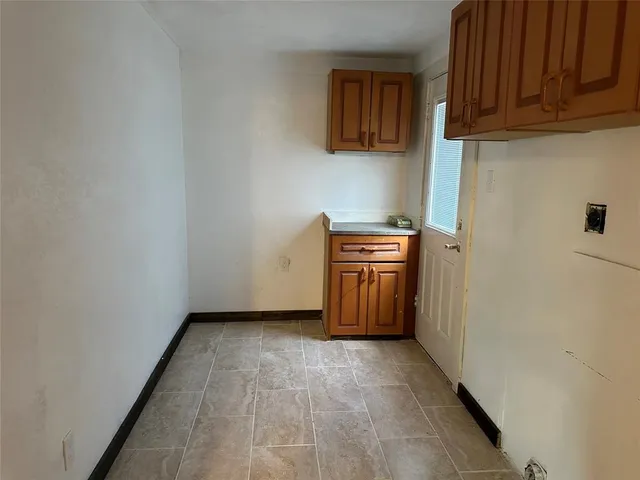 a view of a storage & utility room with washer and dryer