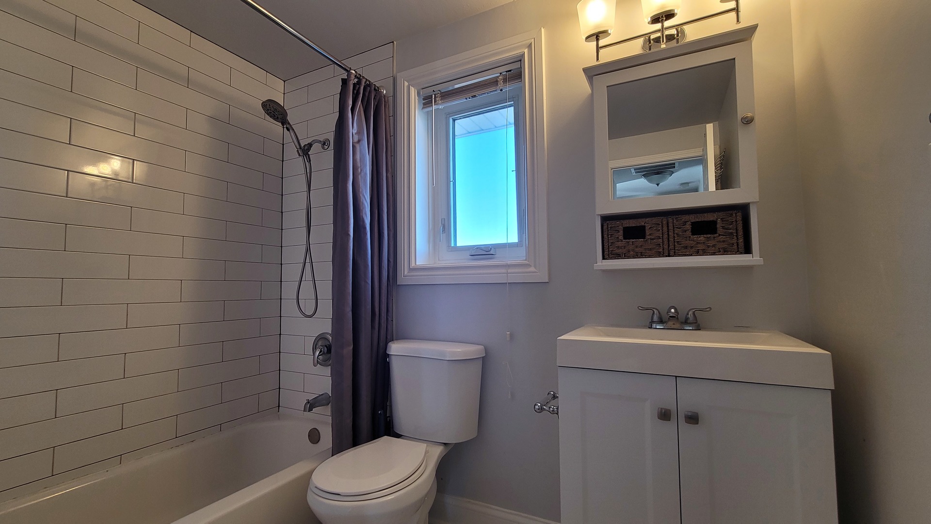 120 Cotuit Court, Unit 120 Schaumburg, IL 60193 - Photo 15 of 17 a bathroom with a sink toilet and shower
