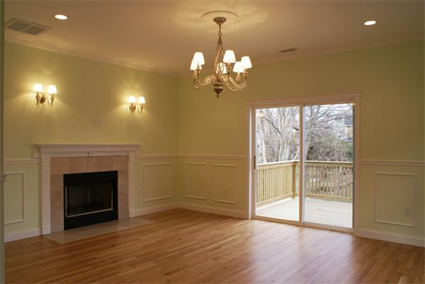 368 Langley Road Newton, MA 02459 - Photo 1 of 1 a view of a livingroom with a chandelier wooden floor and a fireplace
