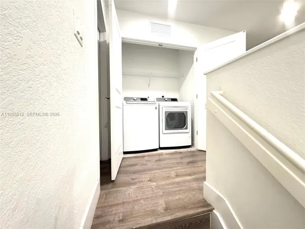 a bathroom with a sink a toilet and a bathtub