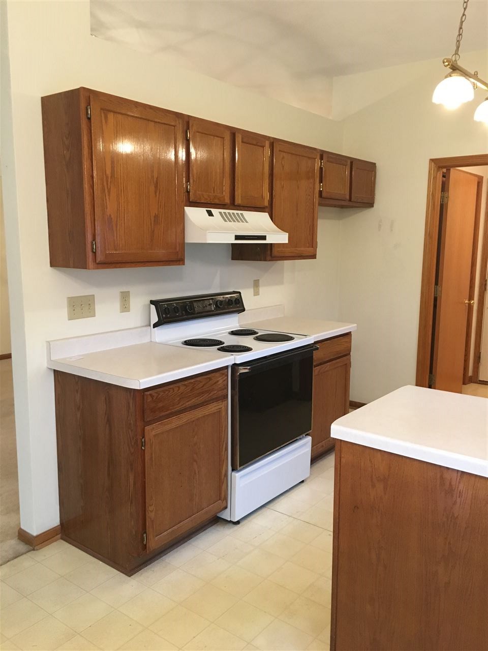 6620 North Point Road, Unit 2 Rockford, IL 61108 - Photo 17 of 21 a kitchen with stainless steel appliances a sink stove and refrigerator