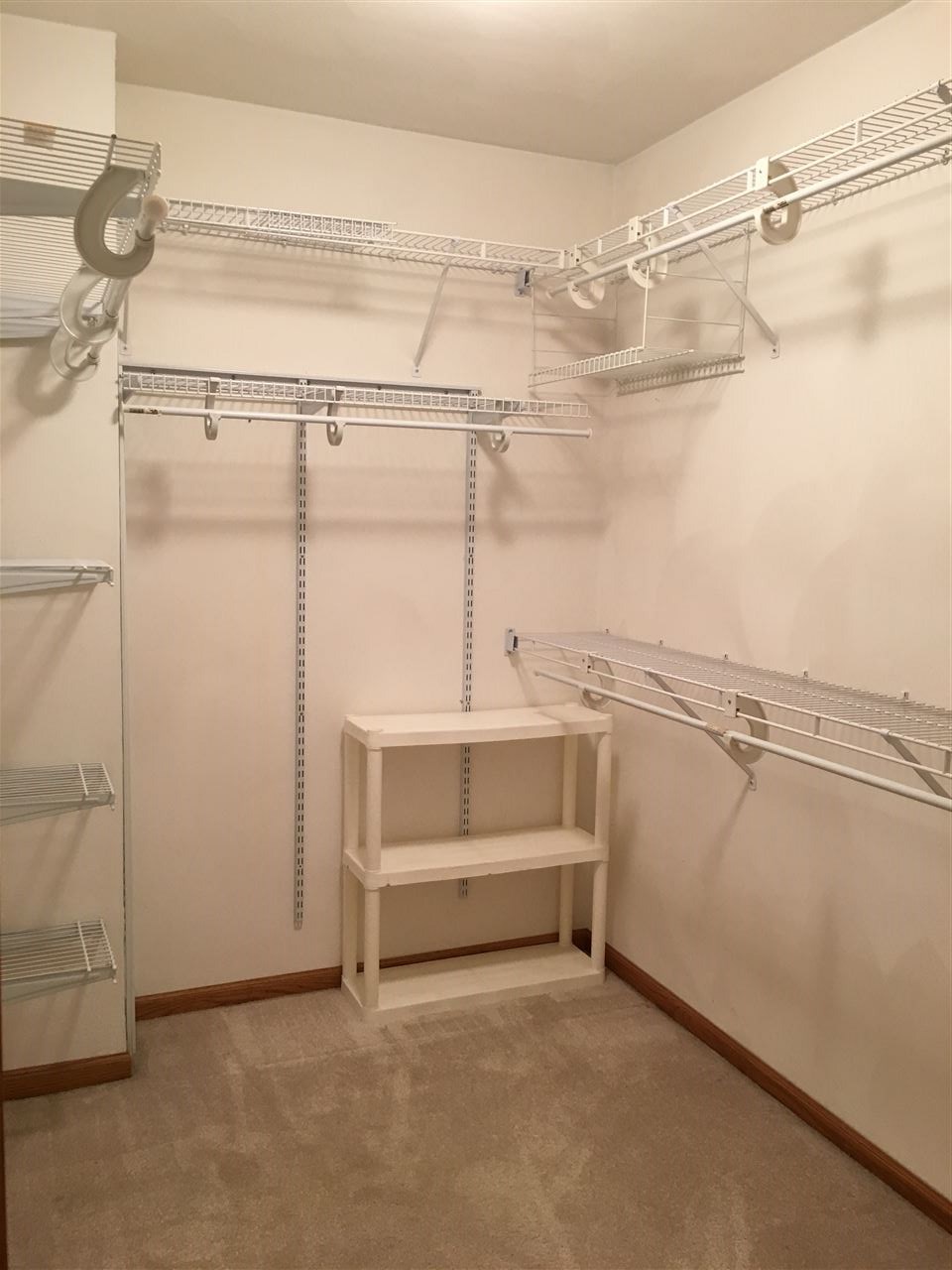 6620 North Point Road, Unit 2 Rockford, IL 61108 - Photo 19 of 21 a view of a room with racks on the wall