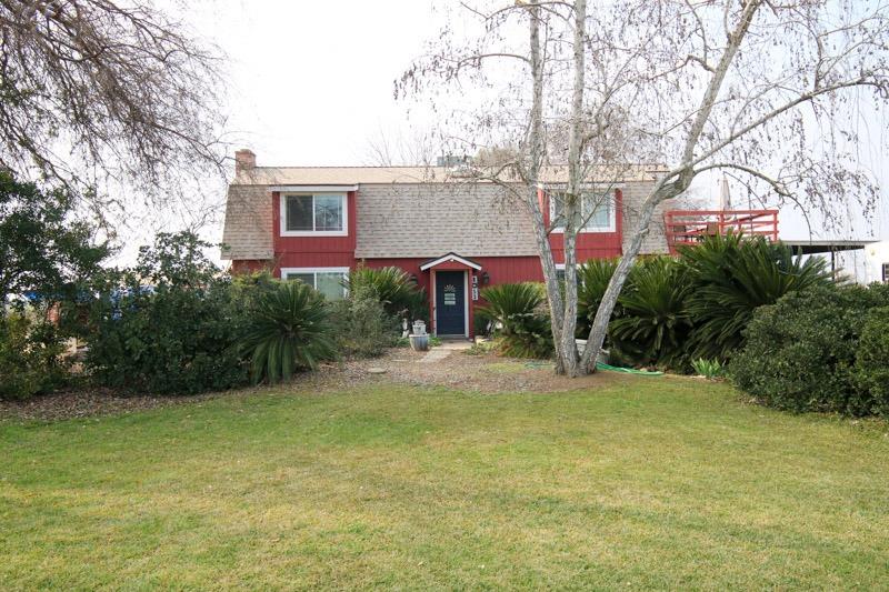 8053 South Rio Avenue Reedley, CA 93654 - Photo 2 of 30 a front view of a house with garden