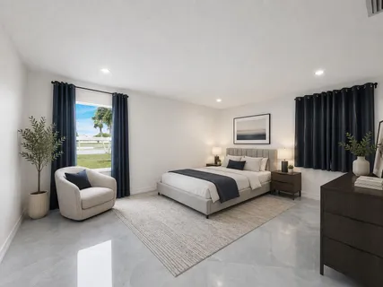 a room with lots of potted plants and glass windows