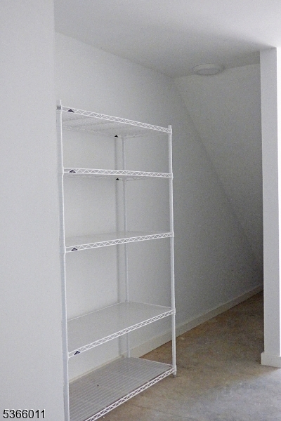 34 Walnut Street Madison, NJ 07940 - Photo 17 of 18 a view of an empty walk in closet