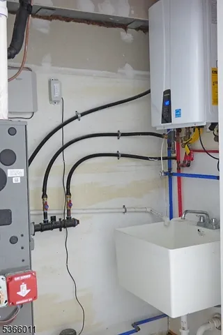 a bathroom with a bathtub and shower