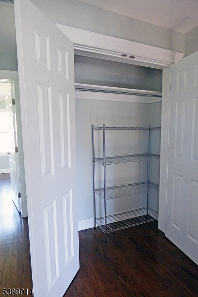 34 Walnut Street Madison, NJ 07940 - Photo 8 of 18 a view of an empty room with wooden floor