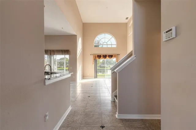 a kitchen with stainless steel appliances a stove a sink and a refrigerator