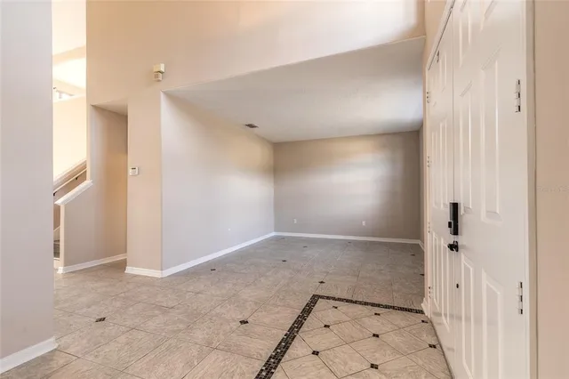 a large bathroom with a large tub sink and double vanity