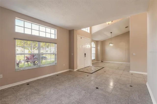 a kitchen with sink stove and microwave