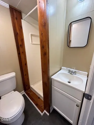 a bathroom with a toilet and a sink