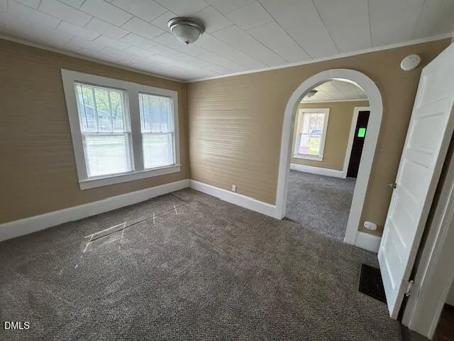 an empty room with windows