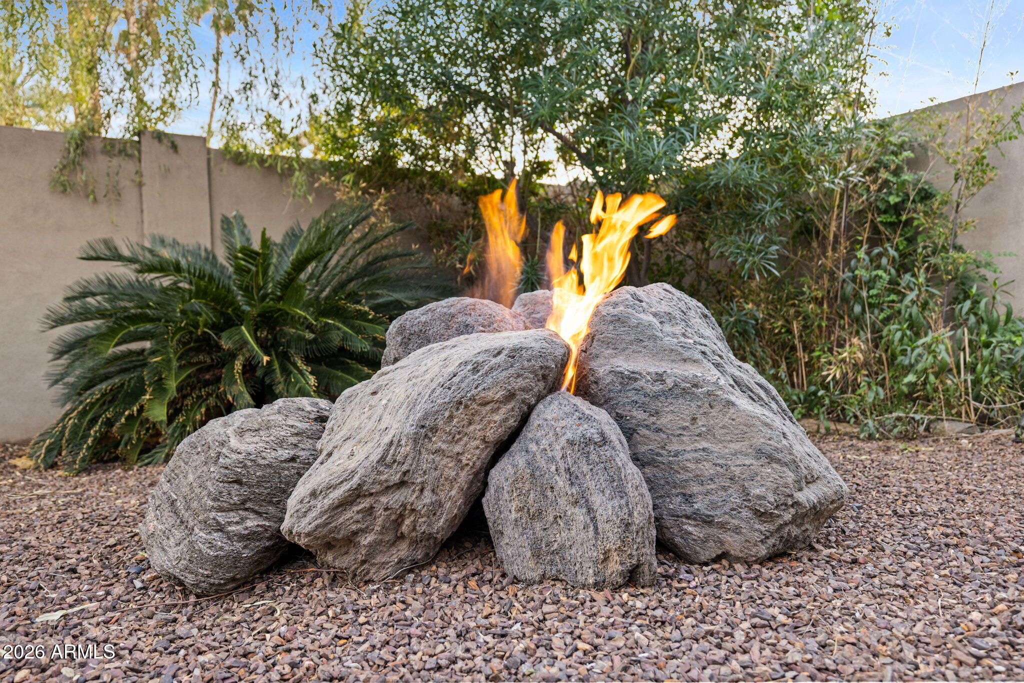 717 East Royal Palm Road Phoenix, AZ 85020 - Photo 35 of 40 Lava rock gas firepit