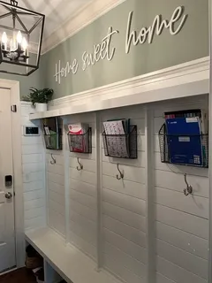 a bathroom with a shower and a sink