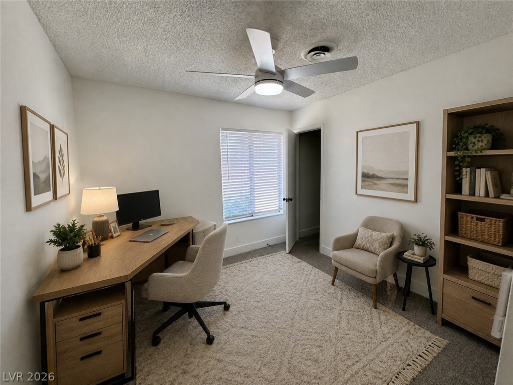 4048 Maple Hill Road Las Vegas, NV 89115 - Photo 10 of 40 Virtually Staged. 1st bedroom or At Home Office with walk in closet, new ceiling fan, new window blinds, new carpet.