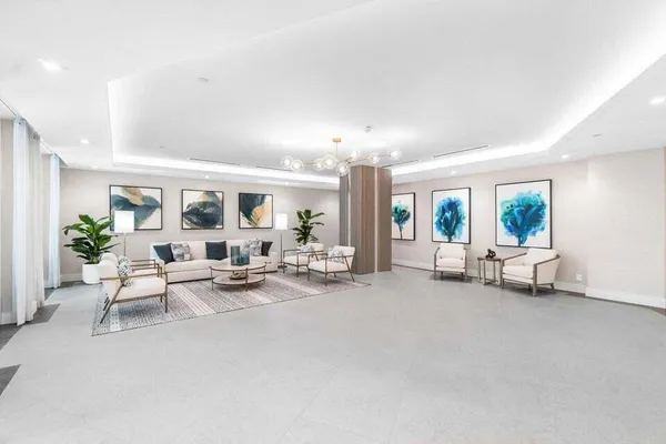 a living room with lots of furniture and a flat screen tv