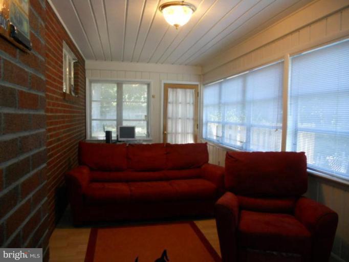 10506 Royal Road Silver Spring, MD 20903 - Photo 2 of 11 a living room with furniture and a window