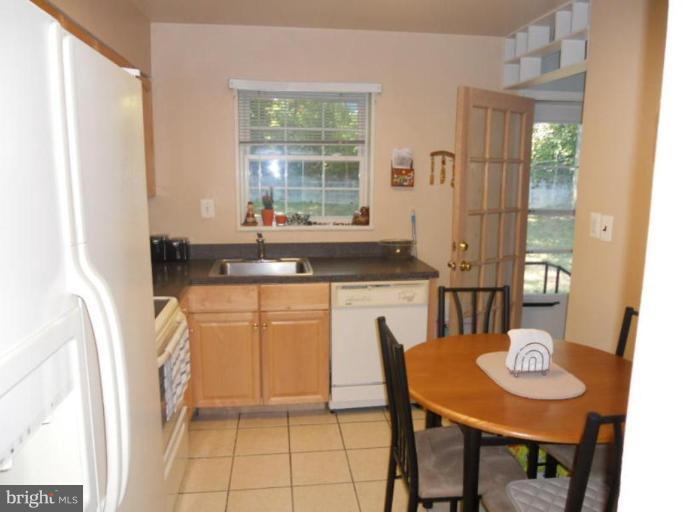 10506 Royal Road Silver Spring, MD 20903 - Photo 7 of 11 a view of a dining room with furniture and window