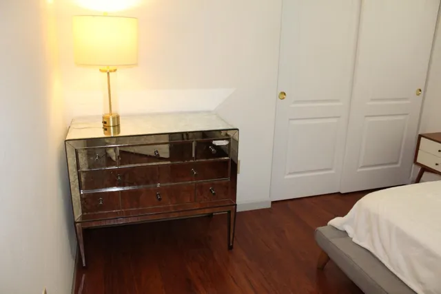 a front view of a house with parking area