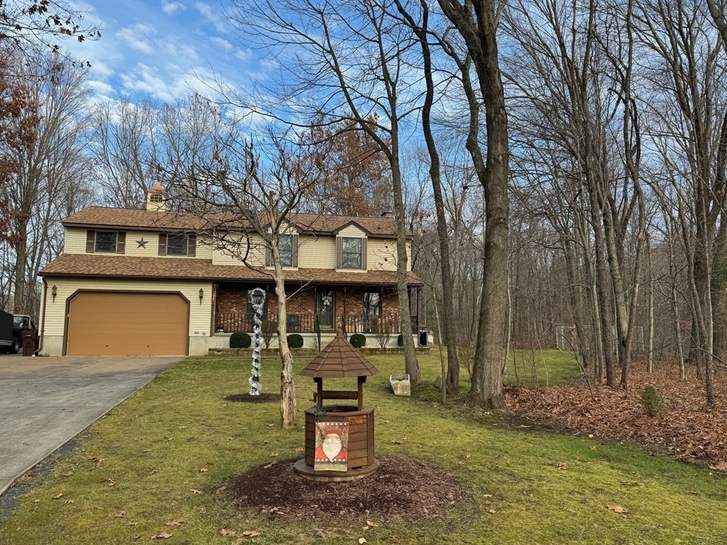 400 N Road Westfield, MA 01085 - Photo 1 of 27 a front view of a house with garden