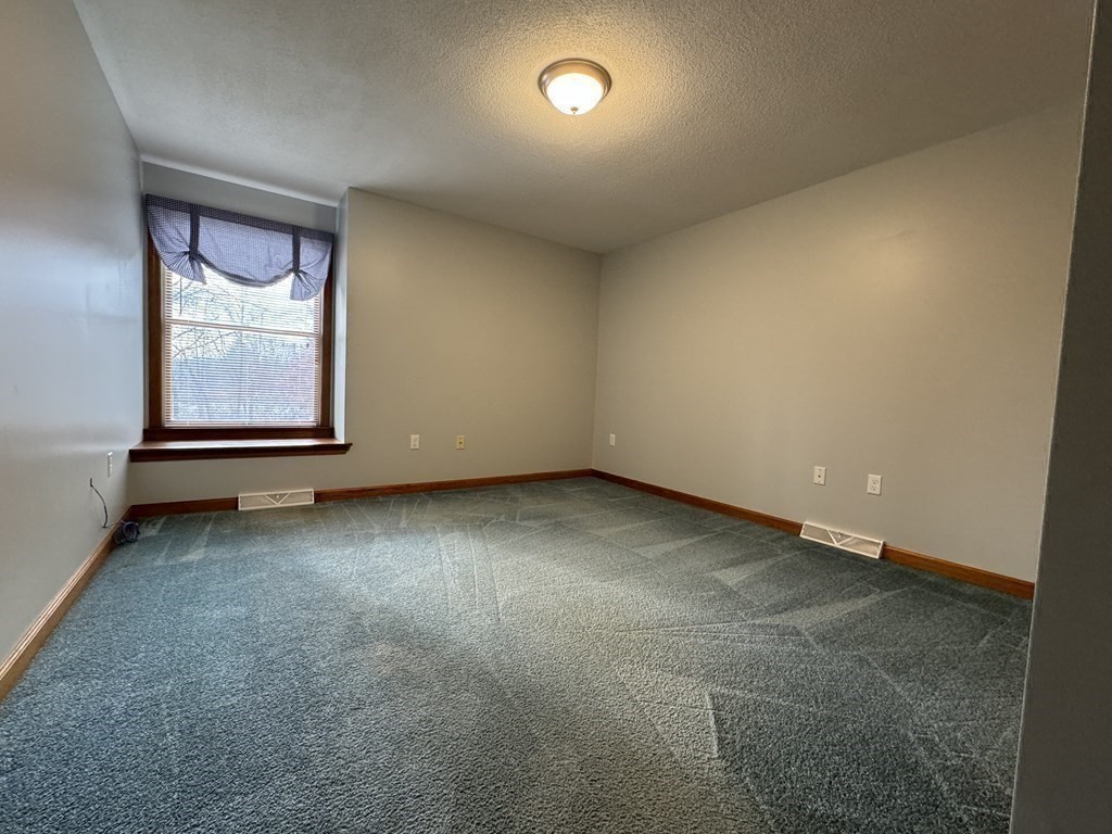 400 N Road Westfield, MA 01085 - Photo 17 of 27 an empty room with windows