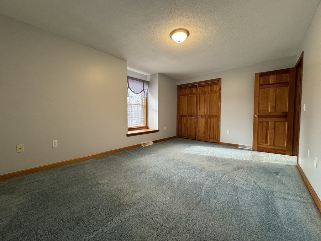 400 N Road Westfield, MA 01085 - Photo 20 of 27 an empty room with windows and closet
