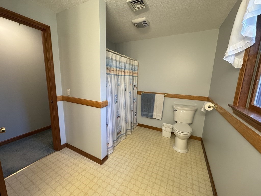 400 N Road Westfield, MA 01085 - Photo 24 of 27 a bathroom with a toilet and a shower
