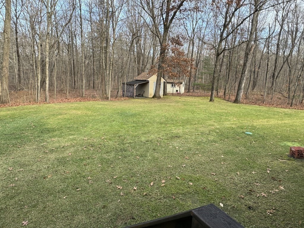 400 N Road Westfield, MA 01085 - Photo 7 of 27 a view of a house with backyard and tree