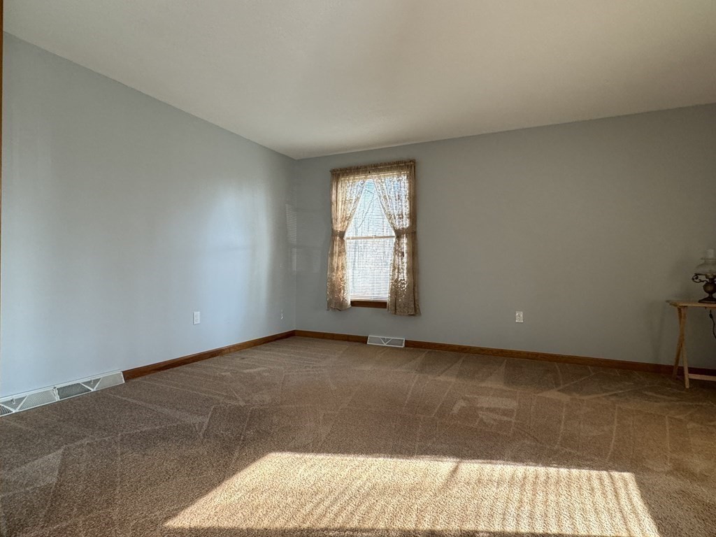 400 N Road Westfield, MA 01085 - Photo 10 of 27 a view of an empty room with a window