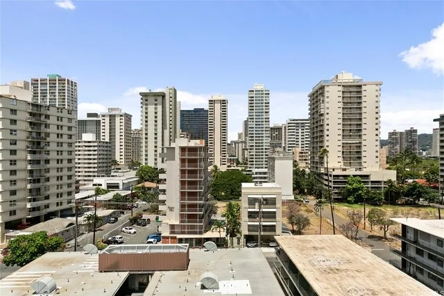 a view of city with tall buildings