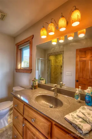 a view of balcony with furniture