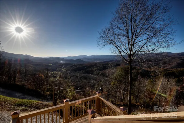 a view of a livingroom with furniture and windows