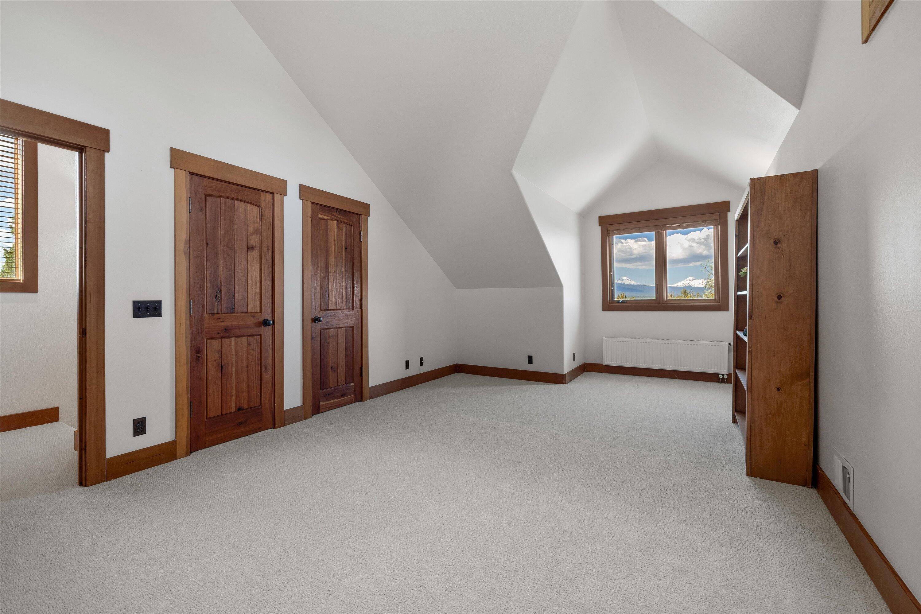 64155 Hunnell Road Bend, OR 97703 - Photo 50 of 96 Generous bedroom two with mountain view.
