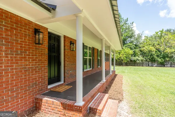 a view of an outdoor space with swimming pool