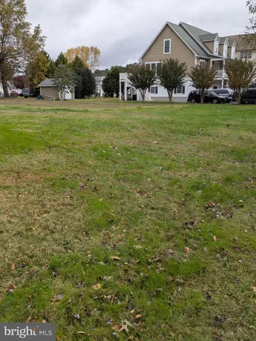 a view of a house with a big yard
