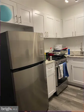 a room with furniture and flat screen tv