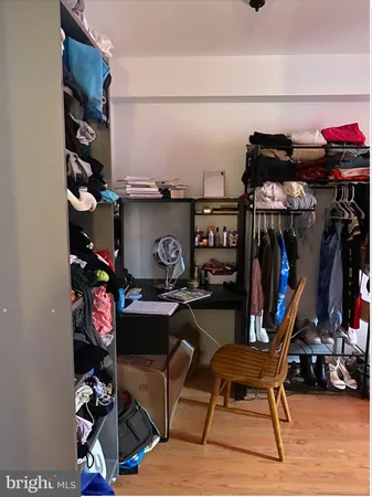 a view of a swimming pool and lounge chairs