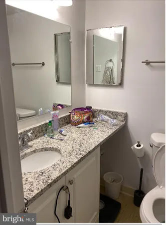 a view of a swimming pool and lounge chairs